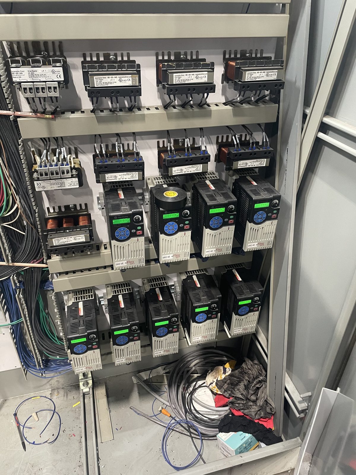 PowerFlex variable frequency drives mounted in a motor control cabinet.